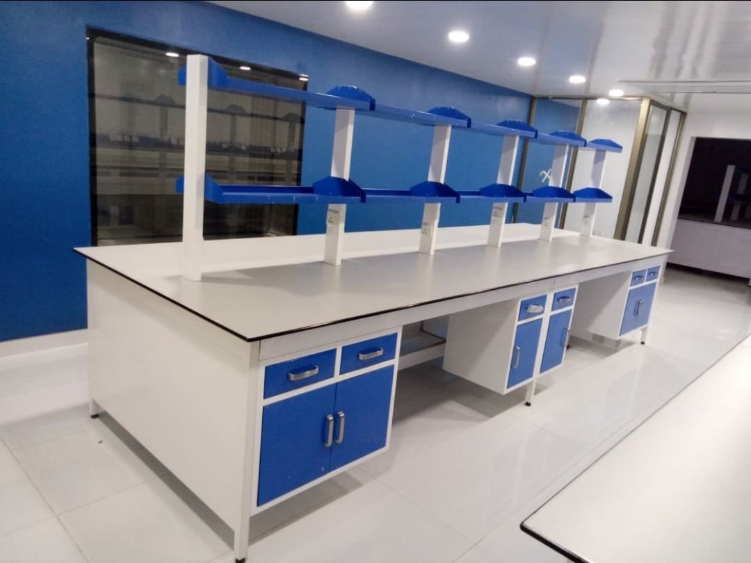 Laboratory island benches with overhead reagent racks